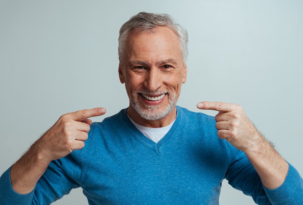 Enhancing Your Smile: Dental Implants And The Smile Makeover Process