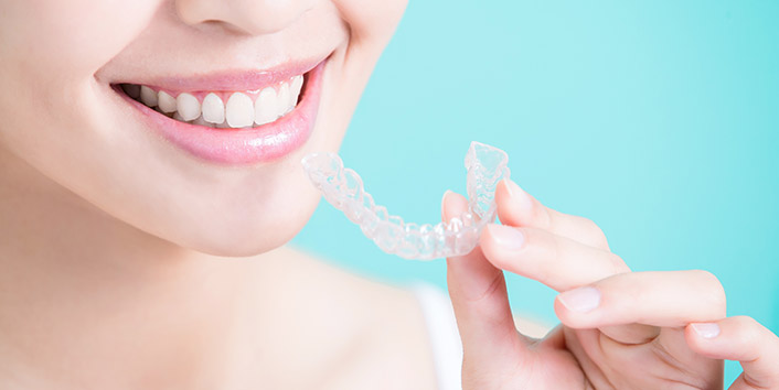 How to Take Care of Teeth During and After Braces - Long Grove